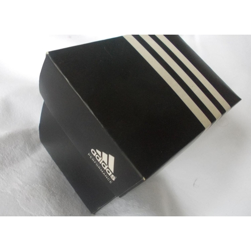 140 - A mens' Adidas wristwatch, in original box,working in as new condition.