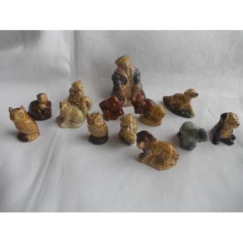 153 - A lot of twelve Wade Whimsies and one Wade Nursery Rhyme Old King Cole figure.