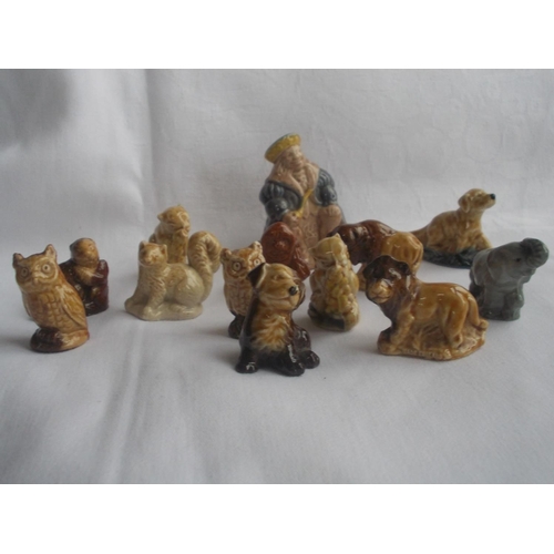 153 - A lot of twelve Wade Whimsies and one Wade Nursery Rhyme Old King Cole figure.