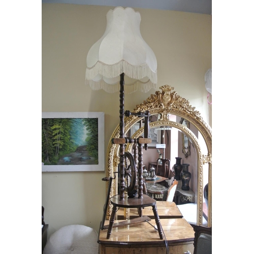 178 - An interesting antique spinning wheel, repurposed as a standard lamp.