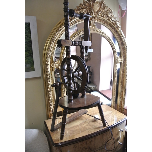 178 - An interesting antique spinning wheel, repurposed as a standard lamp.