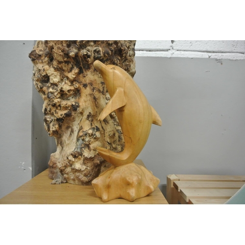 194 - A carved wooden dolphin