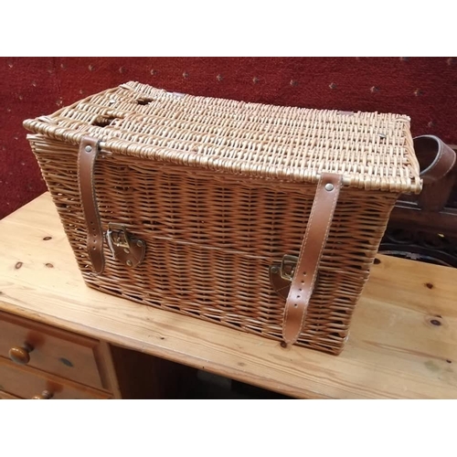 202 - A vintage wicker picnic hamper with contents.