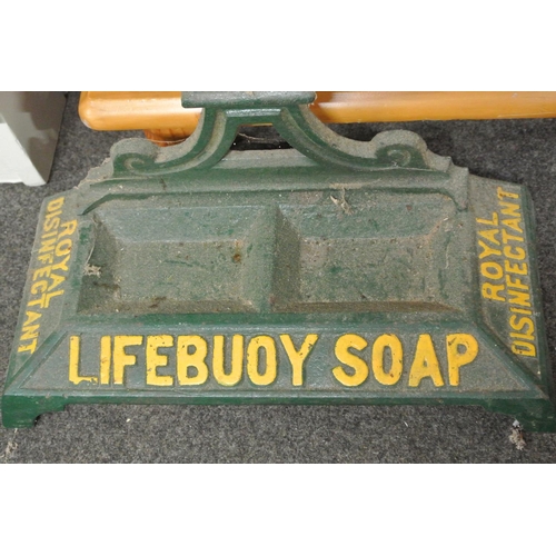 213 - An antique cast iron Sunlight Soap Lifebuoy Soap advertising stick/ umbrella stand.