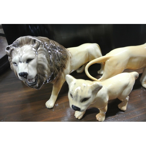 267 - A collection of vintage Beswick animals, to include Lion, Lioness & Lion cub.