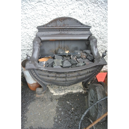 328 - A decorative gas fire basket.