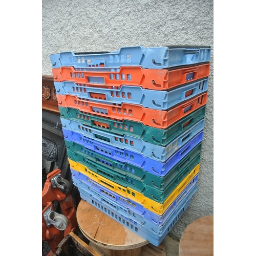 330 - A large assortment of plastic storage trays.