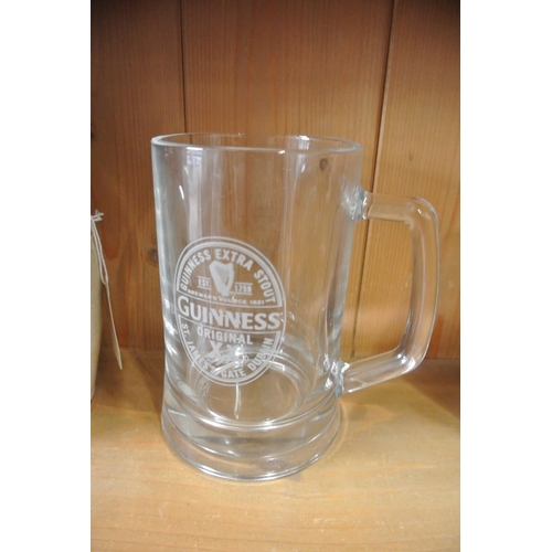 362 - A glass Guinness tankard.