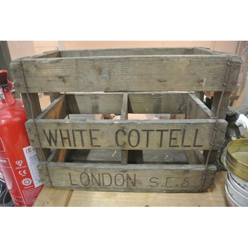 365 - A vintage wooden crate reading 'White Cottell - London S.E.5'.