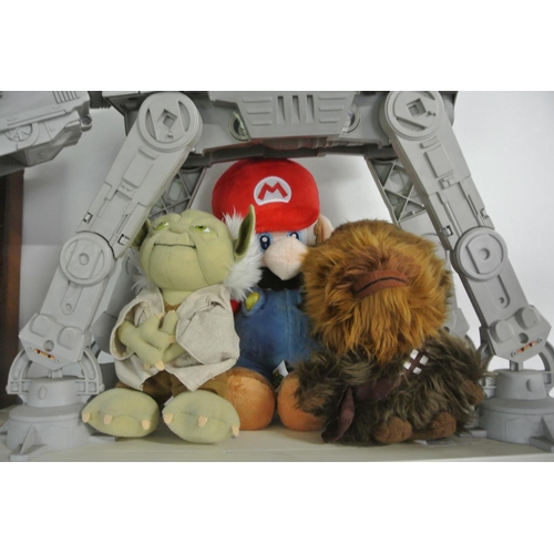 98 - A collection of soft toys to include Mario, Yoda and Chewbacca