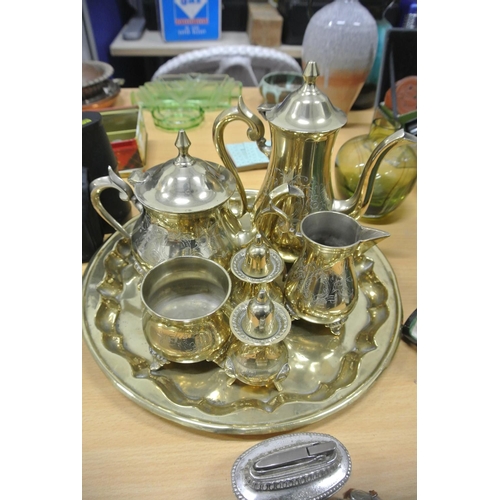 70 - A vintage brass tea service with tray.