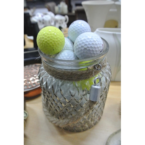 79 - An assortment of golf balls