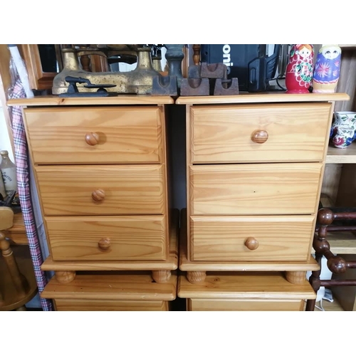 157 - A pair of pine bedside lockers.