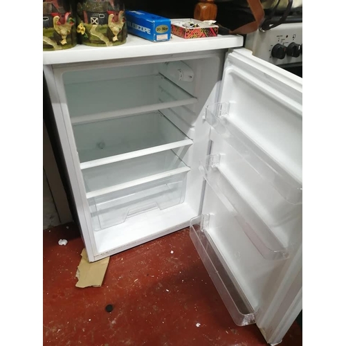 190 - An under counter fridge