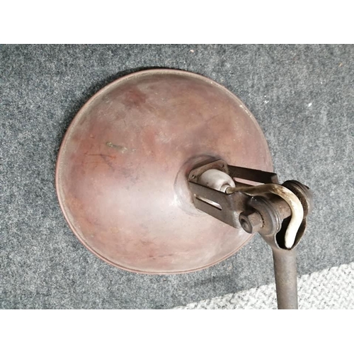 290 - An antique articulated anglepoise lamp with copper shade.