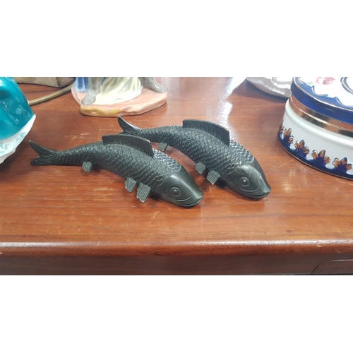 280 - A pair of unusual antique cast metal carp/ fish, believed to be Oriental.