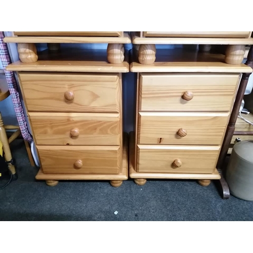 218 - A pair of pine bedside cabinets.