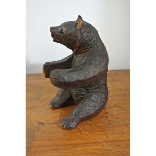 196 - An antique hand carved Black Forest bear figure.