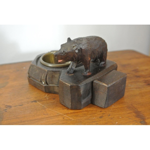 197 - An antique hand carved Black Forest bear figure/ astray with brass bowl.