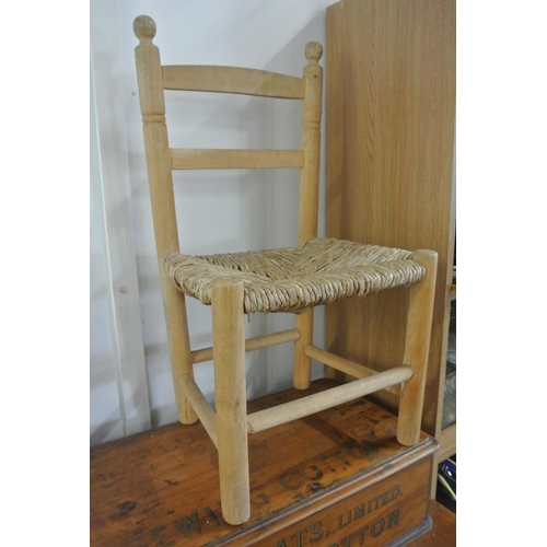 206 - A small wooden Child's chair with woven seat.