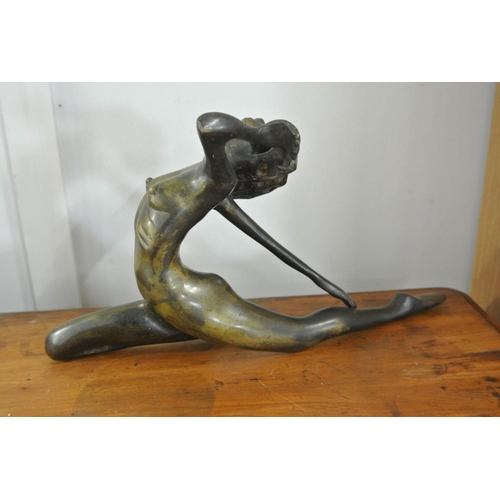 218 - An antique/ Art Deco style bronze nude figure.