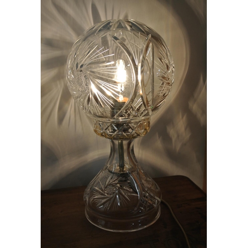 233 - A decorative cut glass table lamp.