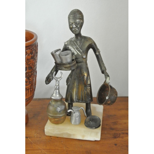 249 - An antique bronze figure & carved wooden cup.