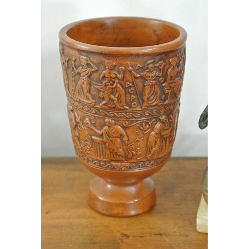 249 - An antique bronze figure & carved wooden cup.