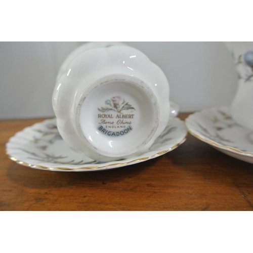 255 - A pair of Royal Albert 'Brigadoon' cups & saucers.