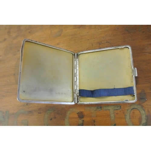 259 - An antique sterling silver cigarette case with simple design, fully hallmarked to the interior.