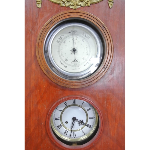 262 - An interesting handmade wall clock with barometer, with cast iron finals & carved case.