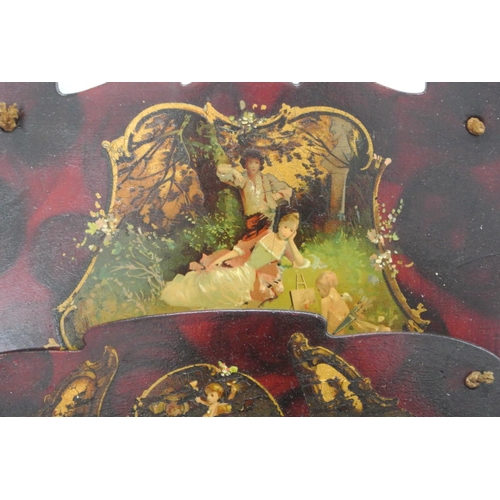 314 - An antique/ Victorian papier mache lacquer letter rack.