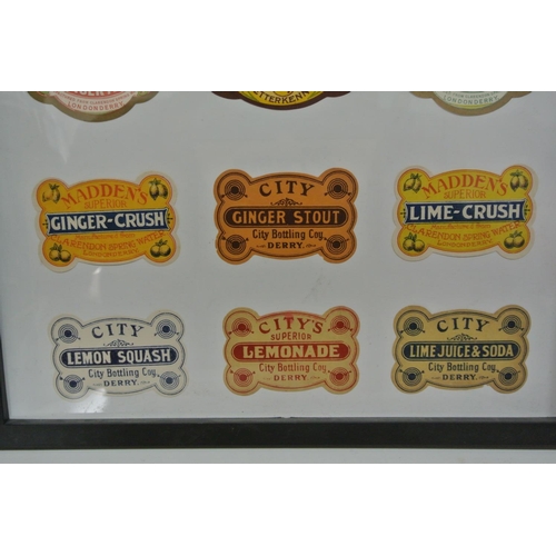 399 - A framed display of various vintage paper labels, to include Maddens & City Bottling Co - Derry.