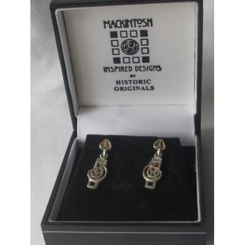 451 - A stunning pair of Mackintosh silver earrings, marked 925, in original box.