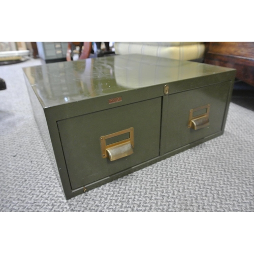 110 - A vintage industrial set of metal index card drawers.