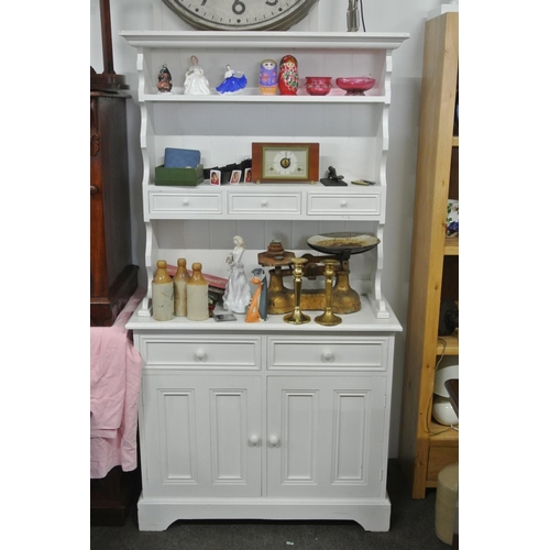 114 - A white kitchen dresser.