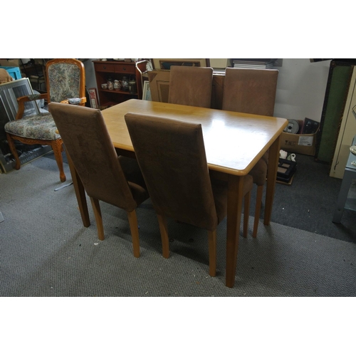 128 - A dining table with 4 chairs.