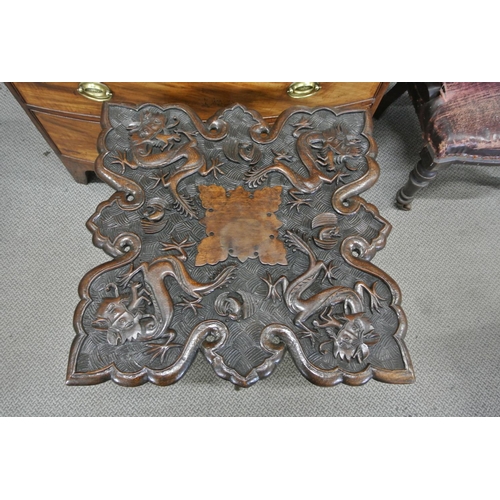 136 - A stunning antique hand carved Oriental/ Chinese table with dragon design.