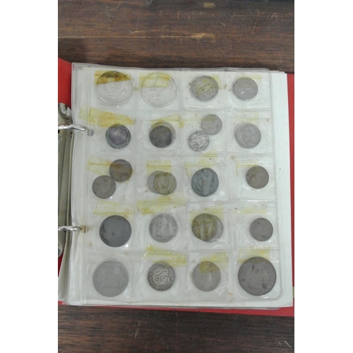 146 - A vintage coin album with contents.