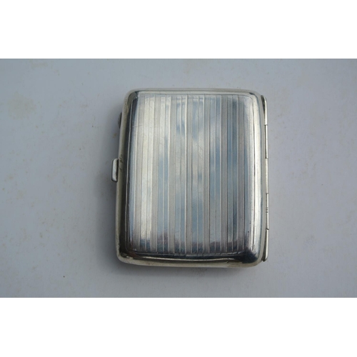 82 - An antique sterling silver cigarette case with gilt interior, produced by John Rose, fully hallmarke... 