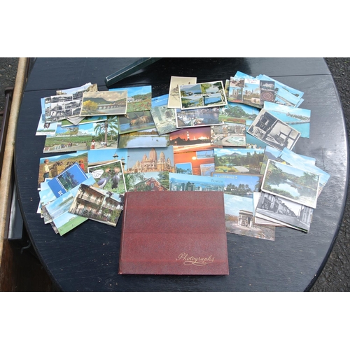 85 - A large assortment of various postcards.