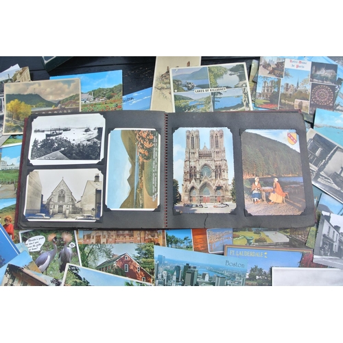 85 - A large assortment of various postcards.