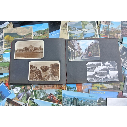 85 - A large assortment of various postcards.