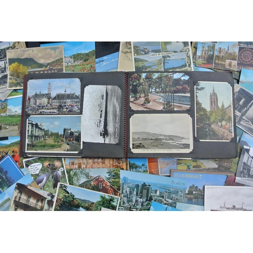 85 - A large assortment of various postcards.