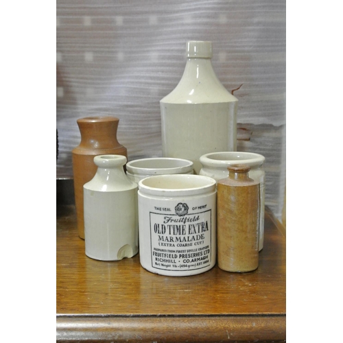 94 - A collection of vintage/ antique stoneware bottles.