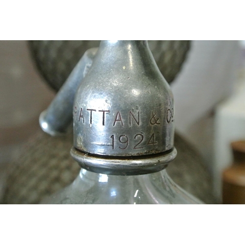 97 - A vintage/ antique glass soda syphon, for Grattan & Co - Belfast, with original paper label to rear.