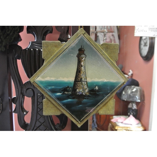 186 - A pair of antique Dutch glass panels of a ship & lighthouse.