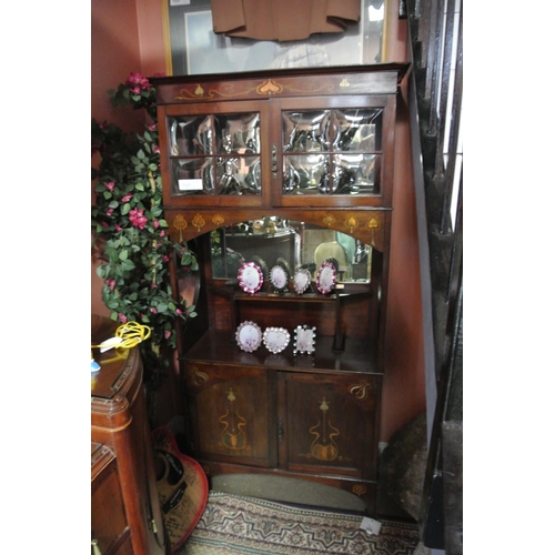 194 - A stunning antique Art Nouveau mirror back display cainet with inlaid copper design.