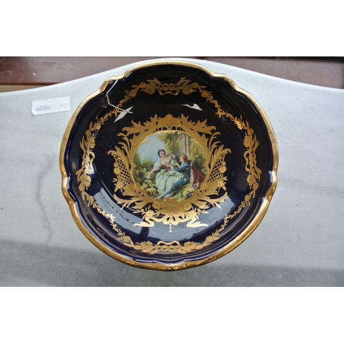 232 - A large antique style dish/ fruit bowl with decorative scene, produced by Reiter.