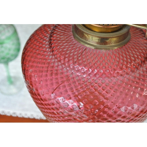 236 - A stunning antique oil lamp with ruby glass font (a/f) & etched glass shade.